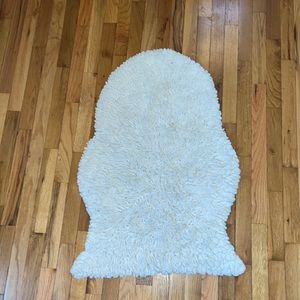 white fuzzy rug